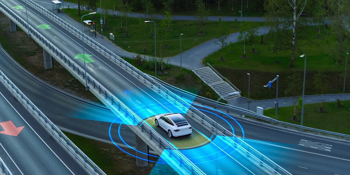 car on freeway - application spotlight for robotaxi company